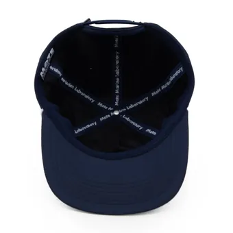 Inside the navy cap, showing the Mote Marine Laboratory interior taping